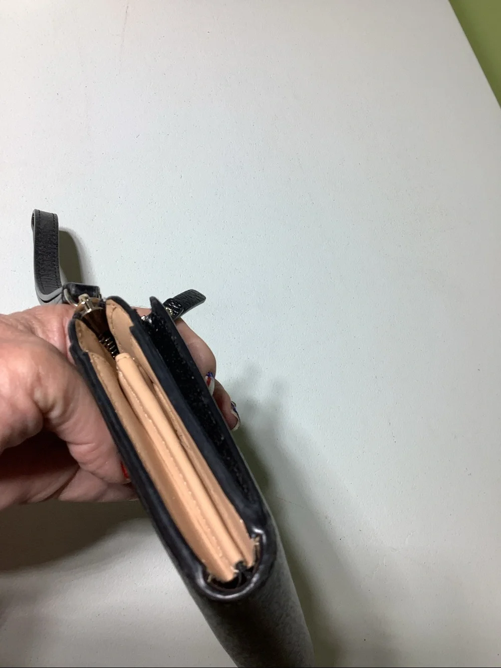 Kate Spade NY black zip around wristlet/wallet